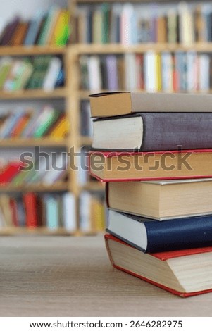 books on the table, 
stack of books,stack of books on white blurred background, education, reading, 
High quality photos of books, school, library, William Shakespeare