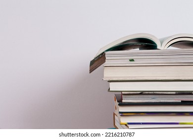 Books and school supplies on a white background with clipping path. You can change the background to whatever you want - Shutterstock ID 2216210787