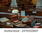 Books Shelf inside a library Antique and rare Books inside The Peabody Library building, opened in 1878, was designed by Baltimore architect Edmund G. Lind 