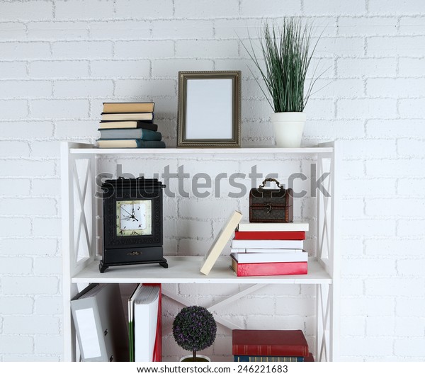 Bookshelves Books Decorative Objects On Brick Stock Photo Edit