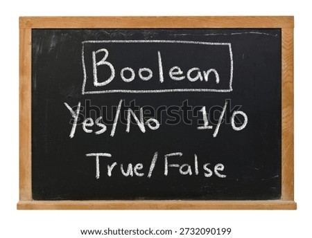 Boolean yes no one zero true false concept handwritten in white chalk on a black chalkboard in a wooden frame isolated on white