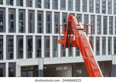 A boom lift is used for work at height. For example, for cleaning or mounting facades
