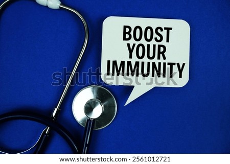 Boost Your Immunity text message on speech bubble with stethoscope on blue background