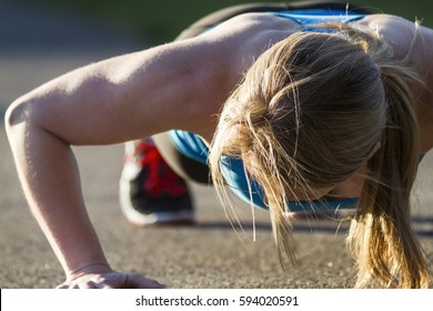 Boot Camp Pushups
Ground level view of boot camp participant completing a pushup. - Powered by Shutterstock