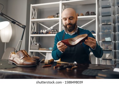 Bootmaker Repairing The Shoe, Footwear Repair