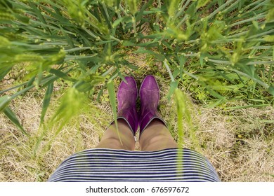 Boots in the grass