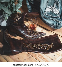 Boots Jeans And Whiskey Still Life