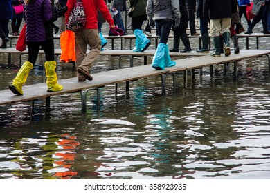 Boots and other footwear used in High water (Acqua Alta) in Venice, Veneto, Italy - Powered by Shutterstock