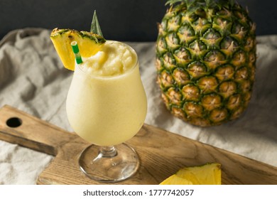 Boozy Frozen Pina Colada Cocktail with Coconut Cream