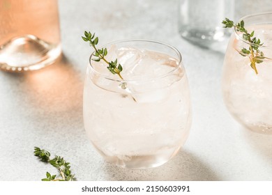 Boozy Pink Rose Wine Spritzer With Ice And Thyme