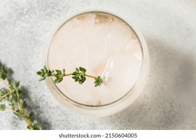 Boozy Pink Rose Wine Spritzer With Ice And Thyme