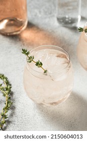 Boozy Pink Rose Wine Spritzer With Ice And Thyme