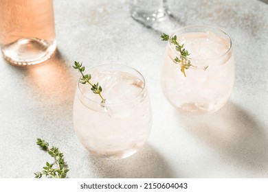 Boozy Pink Rose Wine Spritzer With Ice And Thyme