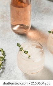 Boozy Pink Rose Wine Spritzer With Ice And Thyme