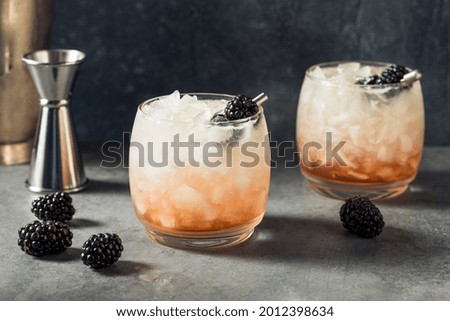 Boozy Refreshing Bramble Cocktail with Gin and Blackberries