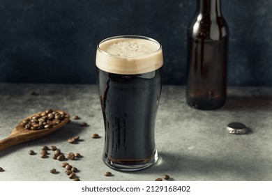 Boozy Refreshing Coffee Stout Beer in a Pint Glass