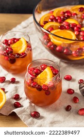 Boozy Refreshing Cranberry Christmas Punch with Champagne Orange and Rum - Shutterstock ID 2222389497