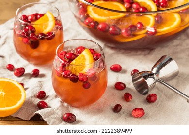 Boozy Refreshing Cranberry Christmas Punch with Champagne Orange and Rum - Shutterstock ID 2222389499