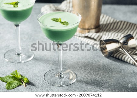 Boozy Refreshing Green Grasshopper Cocktail with Mint and Cream