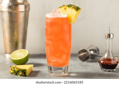 Boozy Refreshing Tiki Singapore Sling Cocktail with Gin and Pineapple - Powered by Shutterstock