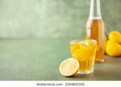 Boozy Refresing Cold Lemon Beer or Radler in a Pint Glass  on wooden table. Copy space - Powered by Shutterstock