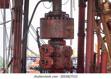 BOP (Blow out preventer) for oil drilling operation which is installed on wellhead, this equipment is using for secure hydrocarbon blowout from downhole. Heavy industrial equipment object photo. - Shutterstock ID 2055827513