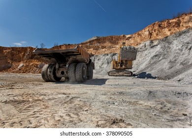 Bor, Serbia - April 15.2015 Group of tourists visiting the Open pit copper mineVeiliki Krivelj at Bor, Serbia. A close encounter with a large excavator