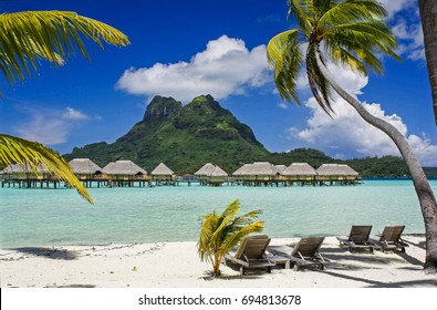 Bora Bora's Mt Otemanu Beach And Bungalow Scene