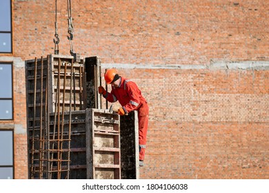 Boratyn, Ukraine- March 26, 2020: Workers At Construction Site Are Installing Demountable And Permanent Formwork