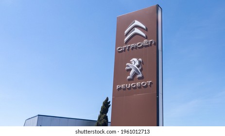 Bordeaux , Aquitaine France - 04 15 2021 : Citroen Peugeot car sign logo and brand text of french dealership automobiles psa group 