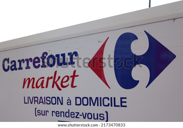 Bordeaux , Aquitaine  France - 06 25 2022 :\
Carrefour market logo sign and brand text supermarket on panel\
delivery van to deliver sall at\
home