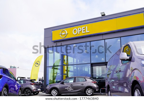 Bordeaux , Aquitaine / France - 07 07 2020 :\
opel store dealership with yellow car sign logo of german shop\
automobile\
manufacturer