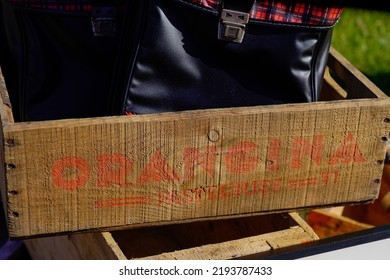 Bordeaux , Aquitaine  France - 08 20 2022 : Orangina Orange Lemonade Logo Sign And Brand Text On Old Wooden Crate