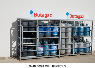 Bordeaux , Aquitaine / France - 09 20 2020 : Butagaz Logo And Text Sign On Gas Bottle Storage Cage For Sale