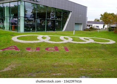 Bordeaux , Aquitaine / France - 11 07 2019 : Audi Car Logo Drawn On Green Grass Lawn Sign Store Dealership Shop Vehicle