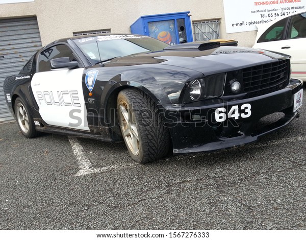 Bordeaux ,\
Aquitaine / France - 11 19 2019 : Ford Mustang police car\
Transformers Film Decepticon black and\
white