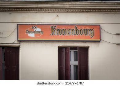 BORDEAUX, FRANCE - FEBRUARY 21, 2022: Logo of Biere de Kronenbourg beer on a retailer bar in bordeaux. Kronenbourg is an industrial french pale lager beer owned by the carlsberg group.