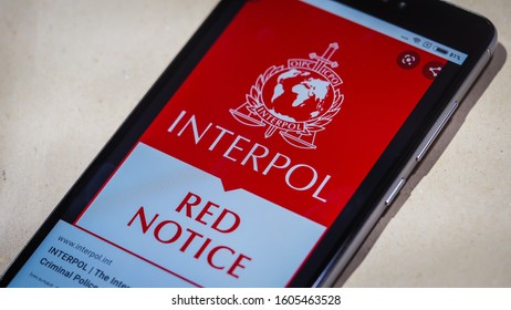 Bordeaux, France - January 04, 2020 : Interpol Red Notice Displayed On Mobile Phone Screen Top Urgent Procedure.