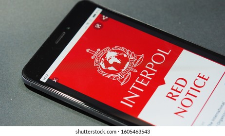 Bordeaux, France - January 04, 2020 : Interpol Red Notice Displayed On Mobile Phone Screen Top Urgent Procedure.