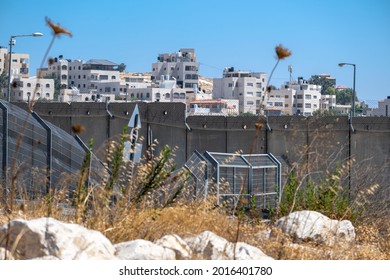 Border And Fence Between Israel And Palestine. Barbed Wire Wall