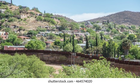 Border Fence Separating The United States And Mexico From Nogales, Arizona