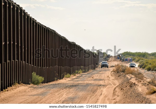 Border fencing along New Mexico\'s international\
border with Mexico.