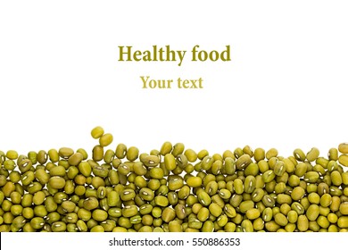 Border of mung green beans closeup with copy space on white background. Isolated. Healthy protein food.