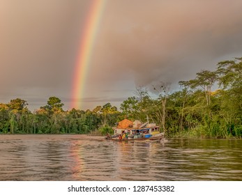 Border Of Peru And Brazil - May 05, 2016: Rainbow Over The Boat On Amazon River Latin America. Javarii River. Yavarii River.