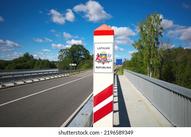 Border post on the border of Latvia. Inscription: Republic of Latvia. Selective focus.