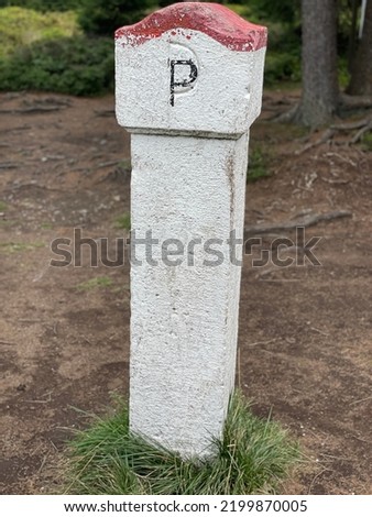Border stone at Czech Polish border in Rychlebske hory mountains close to Jesenik town. This region was called Silesia partly belonged to Austria than Prussia and later Germany. Nowadays it is Czechia