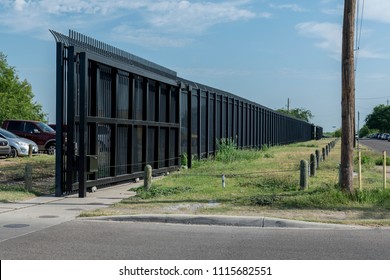 Border Wall On The Texas US Mexico Border In Eagle Pass, TX In Maverick County. 