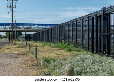 Border Wall And Port Of Entry On The Texas US Mexico Border. 