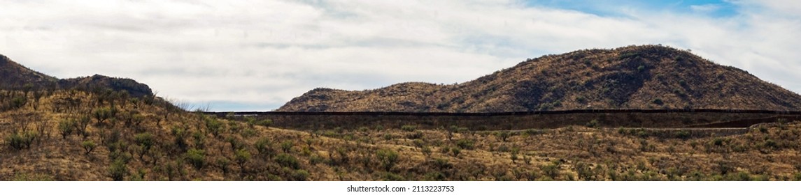 The Border Wall In Southern Arizona That Separates The United States From Mexico. 