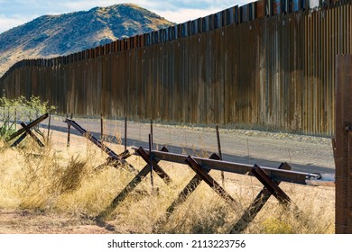 The Border Wall In Southern Arizona That Separates The United States From Mexico. 